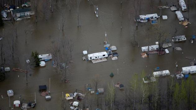 An overhead view showing the flooded residential neighbourhood of Rigaud, west of Montreal. Several rivers and lakes have overflowed their banks in Quebec province, between Gatineau in the Canadian capital region and Montreal 200 kilometers (125 miles) downstream. (Christinne Muschi/REUTERS)