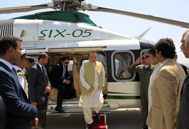 Pakistan Prime Minister Nawaz Sharif disembarks from his helicopter at the newly built airport in Islamabad on Saturday. (Reuters) Pakistan Prime Minister Nawaz Sharif disembarks from his helicopter at the newly built airport in Islamabad on Saturday. (Reuters)
