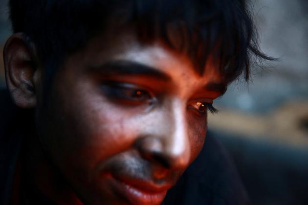Khodor, 20, stands inside a workshop. A day’s work will see 800 kg to 1,000 kg of plastic used in the workshop, where 100 kg of plastic makes approximately 85 litres of fuel. (Bassam Khabieh / Reuters) Khodor, 20, stands inside a workshop. A day’s work will see 800 kg to 1,000 kg of plastic used in the workshop, where 100 kg of plastic makes approximately 85 litres of fuel. (Bassam Khabieh / Reuters)