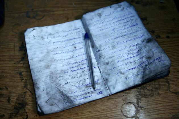 A copybook with delivery orders for fuel lies on a table . The workshop operates 15 hours a day, six days a week, and workers’ only protection against the effects of inhaling the polluted air caused by burning plastic is advice from some to drink two cups of milk a day to try to offset the effects. The efficacy of the treatment is uncertain. (Bassam Khabieh / Reuters) A copybook with delivery orders for fuel lies on a table . The workshop operates 15 hours a day, six days a week, and workers’ only protection against the effects of inhaling the polluted air caused by burning plastic is advice from some to drink two cups of milk a day to try to offset the effects. The efficacy of the treatment is uncertain. (Bassam Khabieh / Reuters)