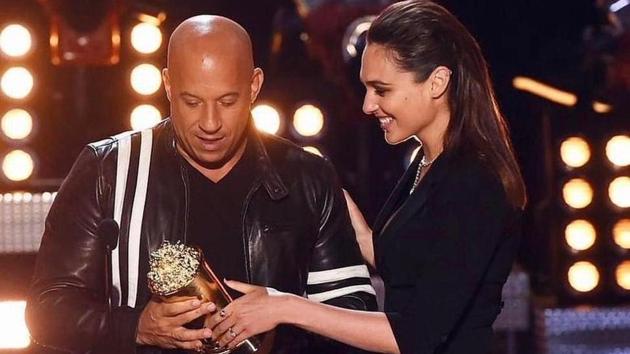 Gal Gadot present Vin Diesel with the Generation Award at the MTV Movie & TV Awards.