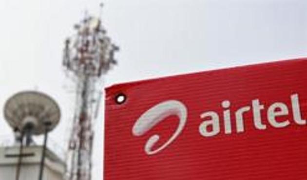 A Bharti Airtel advertisement board is installed against the backdrop of company's telecommunication tower. (Reuters) A Bharti Airtel advertisement board is installed against the backdrop of company's telecommunication tower. (Reuters)