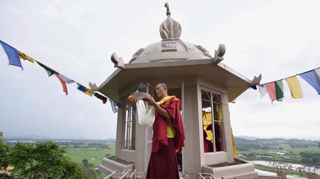 A Buddhist monks offers prayer on the eve of Buddha Purnima at Assam Buddha Vihar, Amingaon in Guwahati. (PTI)