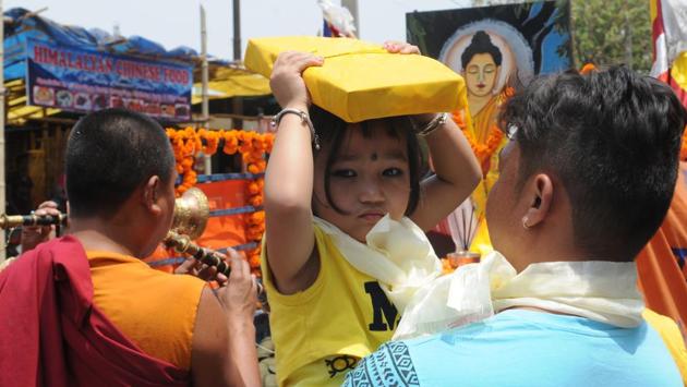 Sermons on the life and teachings of Buddha are held and attended by followers in larger numbers. The relics of the Buddha are taken out for public display in a procession. (Diwakar Prasad/ HT Photo) 