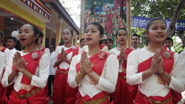 Cambodian students offer prayer to mark the Buddhist Visak Bochea at Oudong hill. (Heng Sinith/AP)
