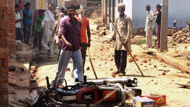 Rioters damage a bike following a clash with the police for not allowing their mahapanchayat in Saharanpur on Friday.(PTI FILE PHOTO)