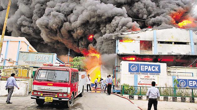 Large quantities of thermocol stored in the factory made it very difficult to put out the fire, but it was brought under control by 9pm, the fire safety officer said. (HT Photo) Large quantities of thermocol stored in the factory made it very difficult to put out the fire, but it was brought under control by 9pm, the fire safety officer said. (HT Photo)
