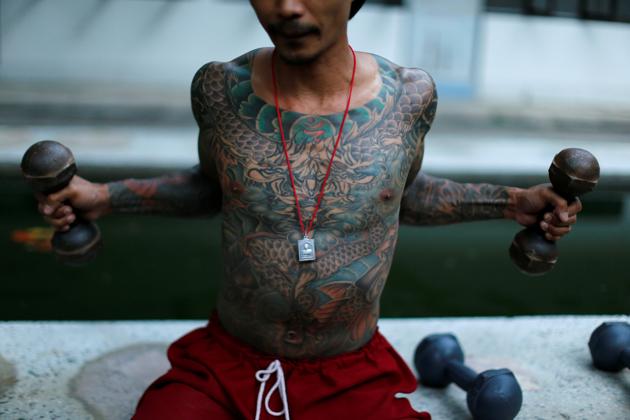 A patient works out at the rehabilitation and detox area at Wat Thamkrabok monastery in Saraburi province, Thailand. (Jorge Silva / Reuters) A patient works out at the rehabilitation and detox area at Wat Thamkrabok monastery in Saraburi province, Thailand. (Jorge Silva / Reuters)