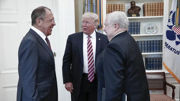 US President Donald Trump meets with Russian Foreign Minister Sergey Lavrov (left) next to Russian Ambassador to the US Sergei Kislyak at the White House in Washington on Wednesday. (AP) US President Donald Trump meets with Russian Foreign Minister Sergey Lavrov (left) next to Russian Ambassador to the US Sergei Kislyak at the White House in Washington on Wednesday. (AP)