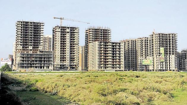 The new real estate law makes it mandatory for all real estate projects and brokers to be registered with the regulator who will oversee transactions and settle disputes. (HT file photo) The new real estate law makes it mandatory for all real estate projects and brokers to be registered with the regulator who will oversee transactions and settle disputes. (HT file photo)