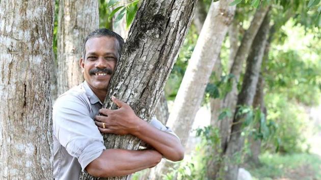 Police inspector V Vidyadharan has been planting trees in two districts of Kerala for the past 40 years.(Vivek Nair/HT Photo) Police inspector V Vidyadharan has been planting trees in two districts of Kerala for the past 40 years.(Vivek Nair/HT Photo)