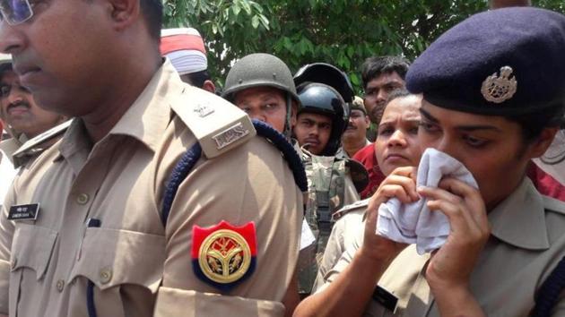 Teary-eyed picture of police officer Charu Nigam after she was publically berated by a BJP MLA Radha Mohan Das Agarwal . (HT File Photo) Teary-eyed picture of police officer Charu Nigam after she was publically berated by a BJP MLA Radha Mohan Das Agarwal . (HT File Photo)