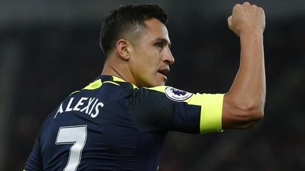 Arsenal's Alexis Sanchez celebrates scoring the first goal against Southampton in their Premier League clash. (REUTERS) Arsenal's Alexis Sanchez celebrates scoring the first goal against Southampton in their Premier League clash. (REUTERS)