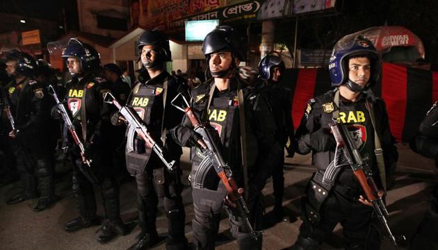 Representative Image: Police raided the house in Habashpur village in Rajshahi district after receiving a tip-off that members of the outlawed Jamayetul Mujahideen Bangladesh (JMB) Islamist group were holed up there. (AP Photo) Representative Image: Police raided the house in Habashpur village in Rajshahi district after receiving a tip-off that members of the outlawed Jamayetul Mujahideen Bangladesh (JMB) Islamist group were holed up there. (AP Photo)