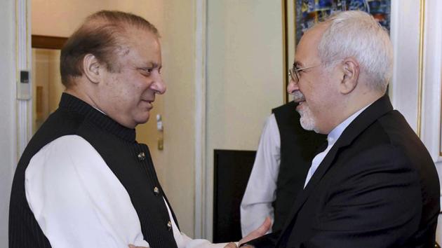 IIranian Foreign Minister Mohammad Javad Zarif with Pakistani Prime Minister Nawaz Sharif (left) meeting in Islamabad, May 3. Pakistan said Wednesday it has reached an agreement with Iran to strengthen security along their shared border following last week's incident in which gunmen killed 10 Iranian border guards. (Press Information Department, Pakistan) IIranian Foreign Minister Mohammad Javad Zarif with Pakistani Prime Minister Nawaz Sharif (left) meeting in Islamabad, May 3. Pakistan said Wednesday it has reached an agreement with Iran to strengthen security along their shared border following last week's incident in which gunmen killed 10 Iranian border guards. (Press Information Department, Pakistan)