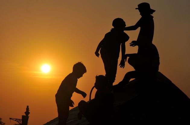 Tourists enjoy the beautiful view of sunset from Ridge on May 11, 2017. The tourists are advised to carry light woollens as the temperatures in the hills have fallen sharply due to continuous rainfall. (Deepak Sansta /HT File Photo) Tourists enjoy the beautiful view of sunset from Ridge on May 11, 2017. The tourists are advised to carry light woollens as the temperatures in the hills have fallen sharply due to continuous rainfall. (Deepak Sansta /HT File Photo)