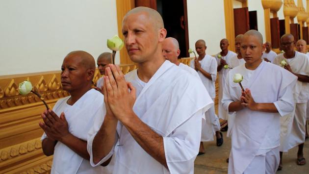 Turkish-German patient Cengiz (C) attends his ordination ceremony at the monastery. (Jorge Silva / Reuters) Turkish-German patient Cengiz (C) attends his ordination ceremony at the monastery. (Jorge Silva / Reuters)