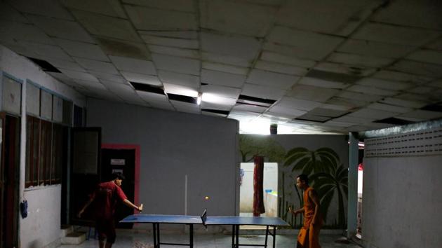Patients playing table tennis at the rehabilitation and detox area . (Jorge Silva / Reuters) Patients playing table tennis at the rehabilitation and detox area . (Jorge Silva / Reuters)