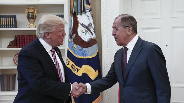 US President Donald Trump (L) shakes hands with Russian foreign minister Sergei Lavrov during their meeting at the White House in Washington, DC. (AFP Photo) US President Donald Trump (L) shakes hands with Russian foreign minister Sergei Lavrov during their meeting at the White House in Washington, DC. (AFP Photo)