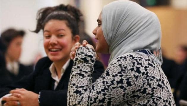Students from the MDQ Academy Islamic School and Saint Anthony’s High School sit in a cafeteria during a field trip at the Roman Catholic school in Huntington, New York, U.S., April 26, 2017. (Reuters Photo) Students from the MDQ Academy Islamic School and Saint Anthony’s High School sit in a cafeteria during a field trip at the Roman Catholic school in Huntington, New York, U.S., April 26, 2017. (Reuters Photo)