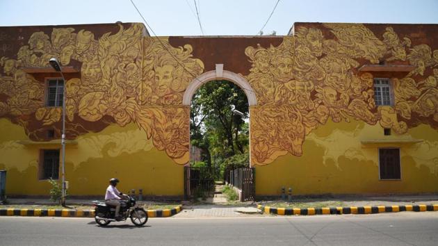 Inspired by the beauty of nature, the yellow painted wall adds colour at the Lodhi art district . (MANPREET SINGH/HT PHOTO)