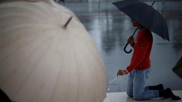 Many pilgrims have trekked for days on foot to the central Portuguese town, some finishing the journey to the small Chapel of the Apparitions on their knees. (Rafael Marchante/Reuters)