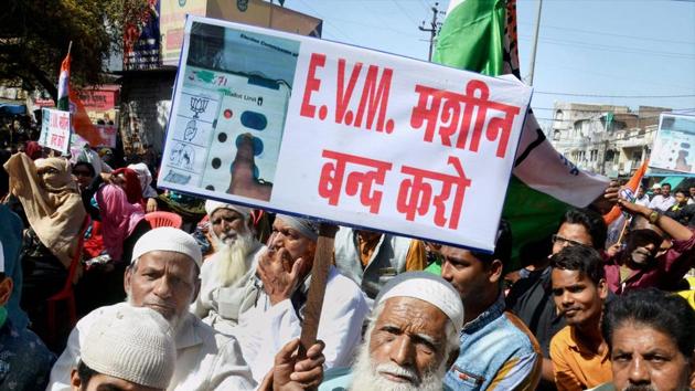Congress party activists during a demonstration against use of Electronic Voting Machines (EVM) in the elections. (PTI) Congress party activists during a demonstration against use of Electronic Voting Machines (EVM) in the elections. (PTI)