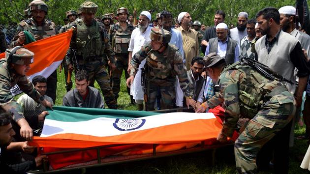Indian Army personnel attend the funeral of Lt Ummer Fayaz, who was killed in Shopian district of Kashmir. (HT Photo) Indian Army personnel attend the funeral of Lt Ummer Fayaz, who was killed in Shopian district of Kashmir. (HT Photo)