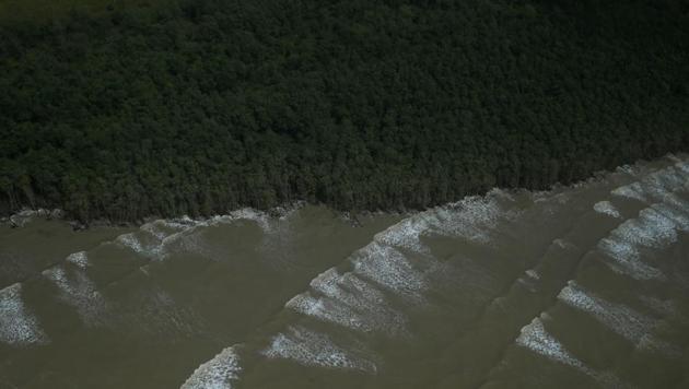 A beautiful Brazilian coastline untouched by commercial tourism may be potentially home to some of the biggest oil finds in the future. Metal drill bits, pipes and containers filled with equipment sit in the tropical port of Belem, near the mouth of the vast Amazon River, ready to sink the first exploratory wells some 120 kms offshore . (RRicardo Moraes/REUTERS)