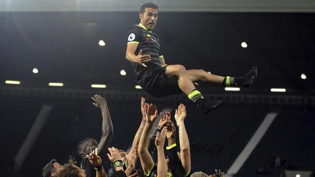 Chelsea Football Club's players, with spirits soaring, decided to take things higher, throwing each other up in the air while celebrating their English Premier League triumph after the match vs West Bromwich Albion on Friday. Pedro, by far, was the most elegant up in the air. (AP)