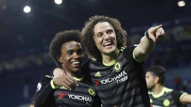 When there is a party, the Brazilians -- Willian and David Luiz combine -- be it scoring goals on the pitch or celebrating Premier League title triumph. (Reuters)