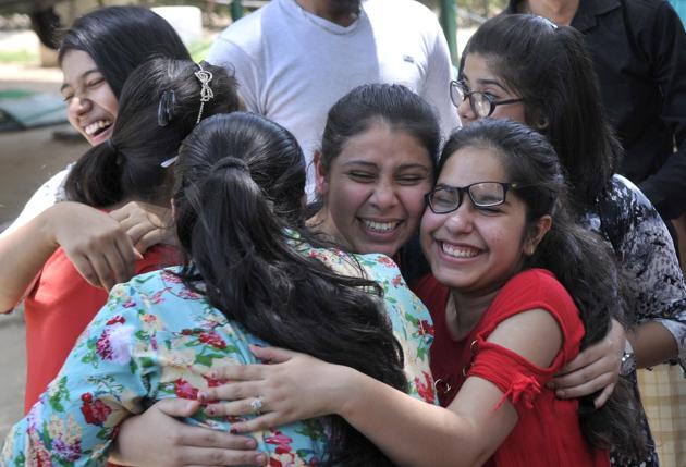 Students in jubilant mood after the declaration of the Class 12 results of PSEB, in Ludhiana. (Gurminder Singh/HT)