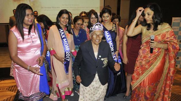 101-year-old Maan Kaur taking part in a ramp walk on the occasion of Mother’s Day celebration at JW Marriott in Sector 35, Chandigarh. (Karun Sharma/HT Photo) 