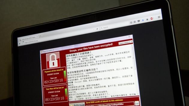 A screenshot of the warning screen from a purported ransomware attack, as captured by a computer user in Taiwan on May 13, 2017. Dozens of countries were hit with a huge cyberextortion attack on Friday that locked up computers and held users' files for ransom.(AP Photo)
