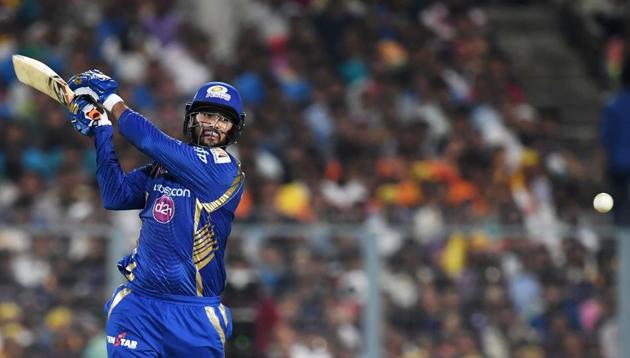 Mumbai Indians (MI) cricketer Saurabh Tiwary hits a boundary during his 42-ball 41 against Kolkata Knight Riders (KKR) in the Indian Premier League (IPL) on Saturday.(AFP)