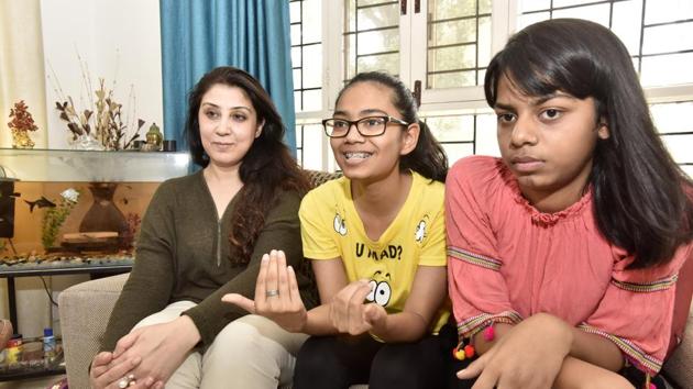 The two girls, Parul Sinha (right) and Akriti Nandy (centre) were unsure how the money would be used if they donated it to a charitable organisation. (Sanjeev Verma/HT Photo) The two girls, Parul Sinha (right) and Akriti Nandy (centre) were unsure how the money would be used if they donated it to a charitable organisation. (Sanjeev Verma/HT Photo)