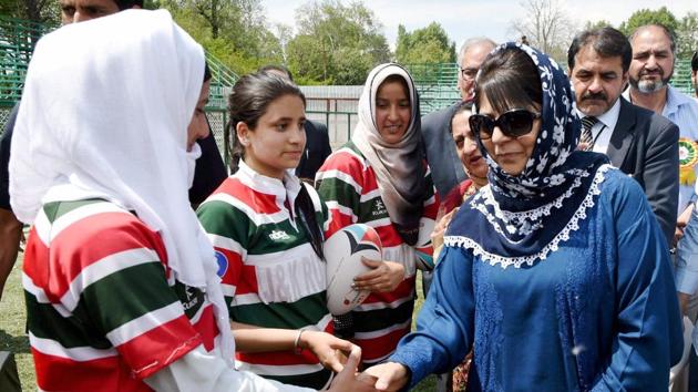 Jammu and Kashmir chief minister Mehbooba Mufti interacts with female rugby players in Srinagar on May 14.(PTI Photo)