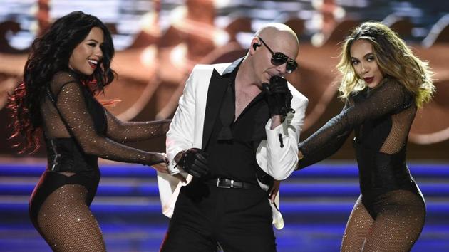 Singer Pitbull performs during the event. (David Becker / REUTERS)