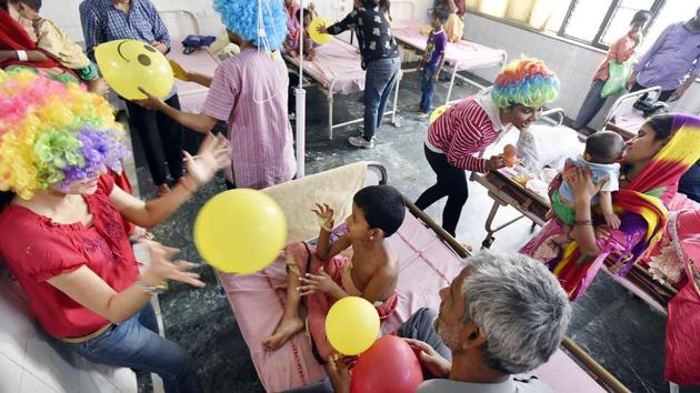 Their ‘Chaplin’ like acts recreates an environment of fun and laughter which gives immense relief to the children. (Raj K Raj/HT Photo)