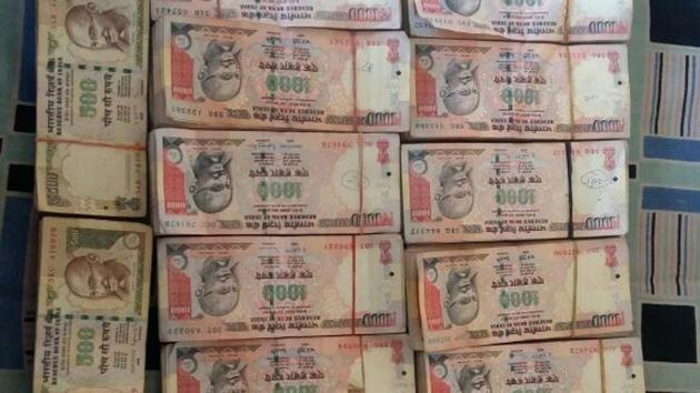 Rs 500 and Rs 1,000 notes amounting to Rs3.25 crore were found from a car on a tip-off. (File Photo) Rs 500 and Rs 1,000 notes amounting to Rs3.25 crore were found from a car on a tip-off. (File Photo)