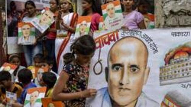 Students carry posters of Kulbhushan Yadav as they protest against his death sentence awarded by a Pakistani military court, in Mumbai, in April 2017.(Kunal Patil/HT File Photo)