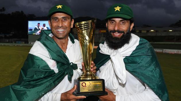 Retiring Pakistan cricket team members Younis Khan (left) and captain Misbah-ul-Haq celebrate with the series trophy after winning the final Test match and the series 2-1 against the West Indies at the Windsor Park Stadium in Roseau, Dominica on Sunday. (AFP) Retiring Pakistan cricket team members Younis Khan (left) and captain Misbah-ul-Haq celebrate with the series trophy after winning the final Test match and the series 2-1 against the West Indies at the Windsor Park Stadium in Roseau, Dominica on Sunday. (AFP)