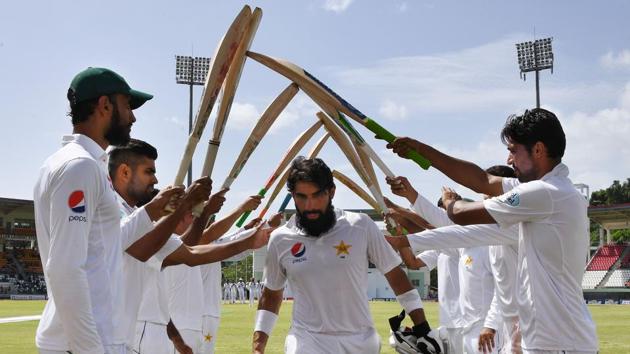 Members of the Pakistan cricket team gave a guard of honour guard for their out-going captain Misbah-ul-Haq after his last Test innings during the third Test vs West Indies cricket team at the Windsor Park Stadium in Roseau, Dominica. (AFP) Members of the Pakistan cricket team gave a guard of honour guard for their out-going captain Misbah-ul-Haq after his last Test innings during the third Test vs West Indies cricket team at the Windsor Park Stadium in Roseau, Dominica. (AFP)