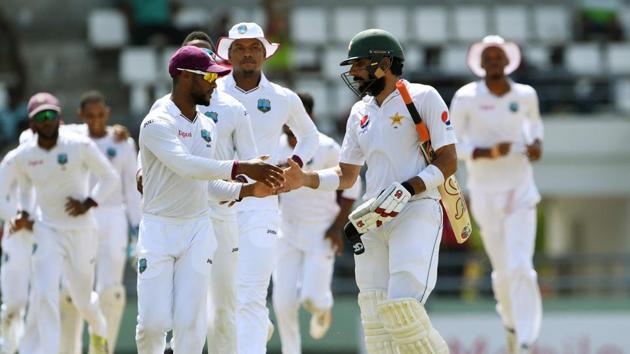 Pakistan cricket team captain Misbah-ul-Haq was greeted by the West Indies cricket team players as he left the ground following his final innings. (AFP) Pakistan cricket team captain Misbah-ul-Haq was greeted by the West Indies cricket team players as he left the ground following his final innings. (AFP)