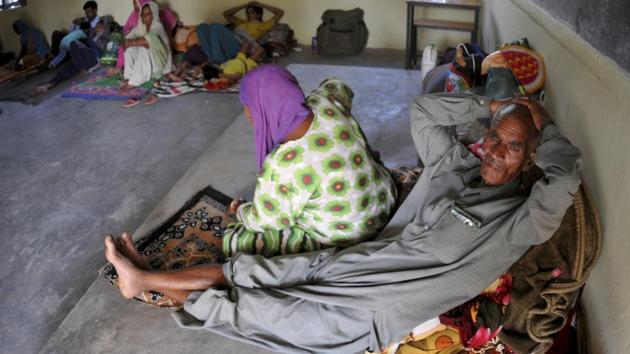 Evacuated villagers seen at a relief camp set up at a government school, along the highly militarized Line of Control that divides the region between India and Pakistan in Nowshera. Evacuated villagers seen at a relief camp set up at a government school, along the highly militarized Line of Control that divides the region between India and Pakistan in Nowshera.