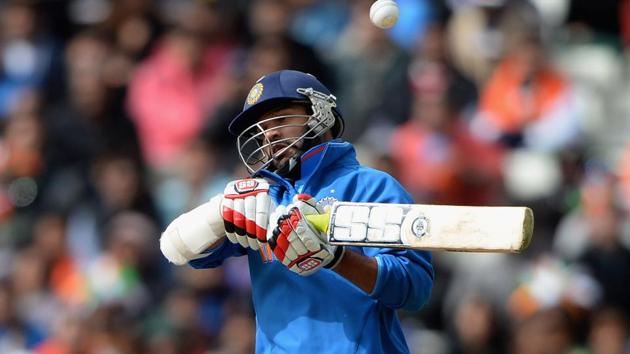 Shikhar Dhawan of India avoids a short ball from Mohammad Irfan of Pakistan during the ICC Champions Trophy match at Edgbaston on June 15, 2013 in Birmingham, England.(Getty Images)