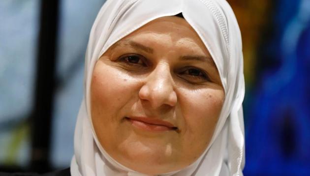 Israeli Muslim Hana Khatib, the first woman in Israel to be appointed by an Israeli justice committee to become a religious judge in the courts ruling on personal law for Muslims poses for a photo on May 15.(AFP Photo)