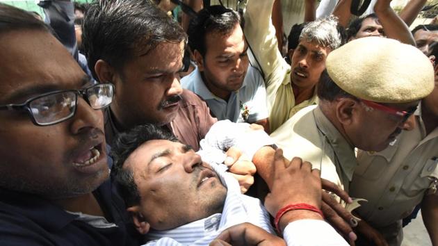 Sacked Delhi water minister, Kapil Mishra fell unconscious after addressing a press conference about the Aam Aadmi Party’s donation sources on Sunday. (Sonu Mehta/HT PHOTO) Sacked Delhi water minister, Kapil Mishra fell unconscious after addressing a press conference about the Aam Aadmi Party’s donation sources on Sunday. (Sonu Mehta/HT PHOTO)