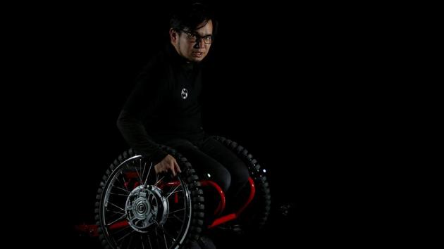 Equipped with special wheels, the motor-assisted wheelchair can be moved by ‘Slide Lift’ racers in any direction, including in racing car-like drifts. (Kim Kyung-Hoon / Reuters)