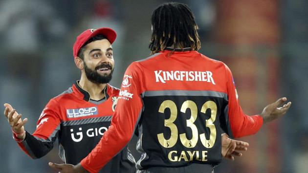 Royal Challengers Bangalore (RCB) skipper Virat Kohli and Chris Gayle celebrate their win against Delhi Daredevils in the Indian Premier League (IPL) on Sunday. Such happy moments were rare for Kohli and his team this year, with the side’s stars, including Gayle, failing to neither fire individually, nor deliver as a unit.(AP)